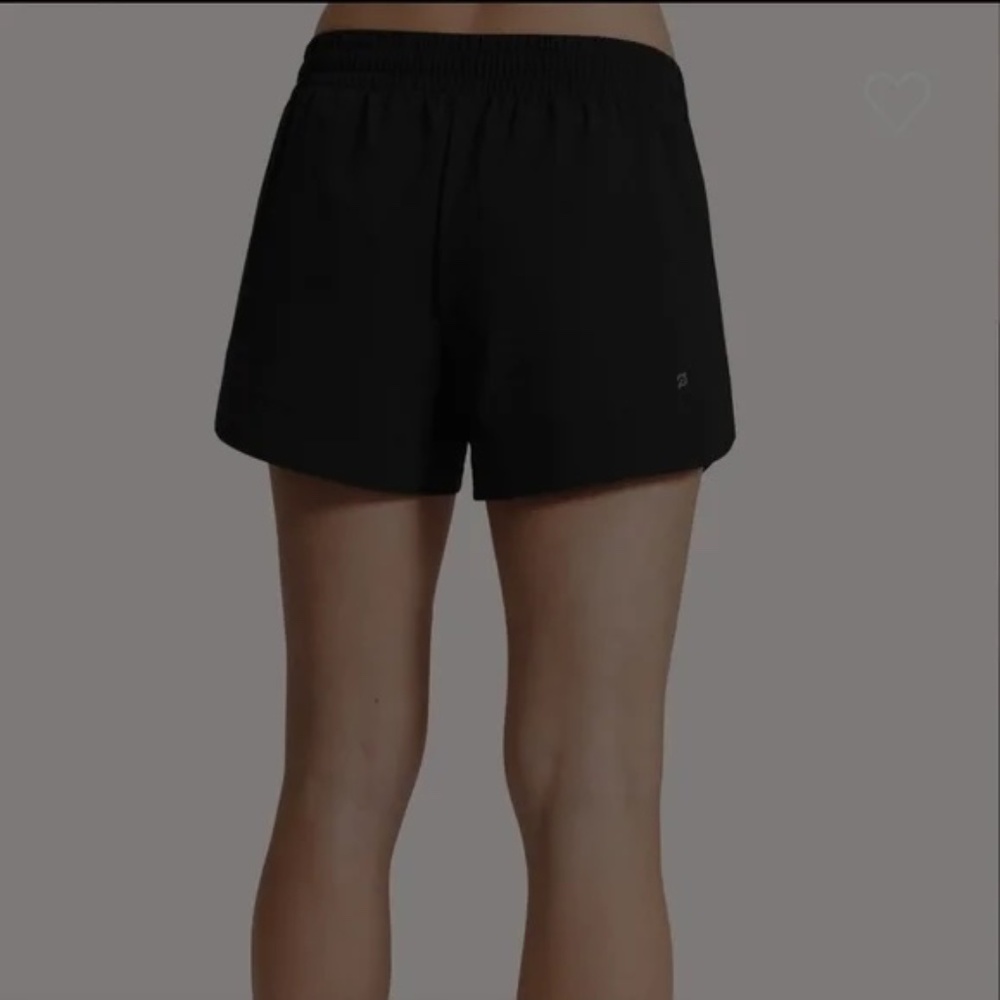 Peloton 4" Tulip Run Short. Black. Size Medium